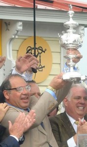 Ahmed Zayat holding the trophy at the 2015 Preakness Stakes